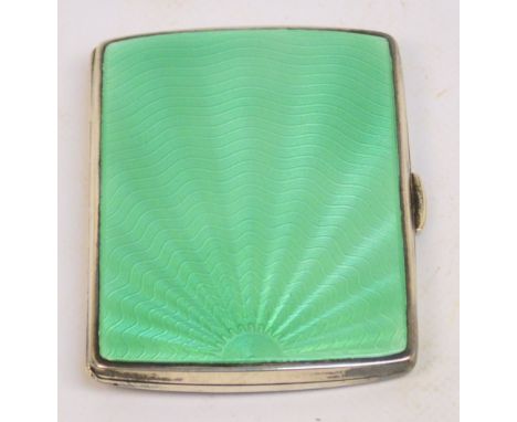 A George VI hallmarked silver and green guilloche enamel decorated Art Deco cigarette case, the reverse with engine turned de
