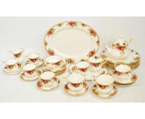 A collection of Royal Albert "Old Country Roses" dinner and teaware comprising one large platter, seven dinner plates, one sa