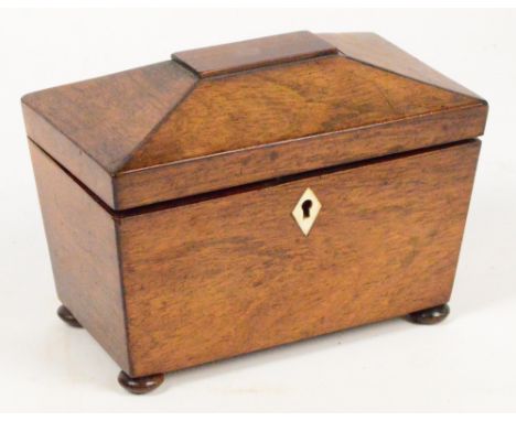 An early Victorian rosewood sarcophagus two division tea caddy raised on squat bun feet, width 19cm.