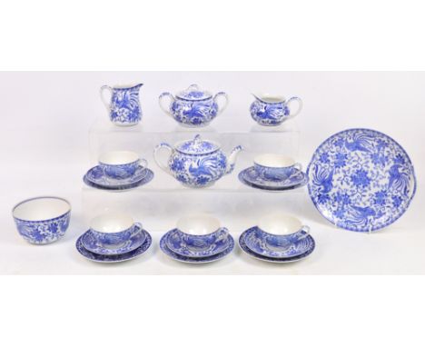 A Noritake blue and white Oriental decorated tea service comprising five cups, five saucers, five side plates, two jugs, suga