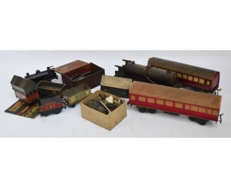 A scratch built steam engine, two large carriages, two Bassett Lowke carriages, a Bassett Lowke open wagon, a LMS livery coal