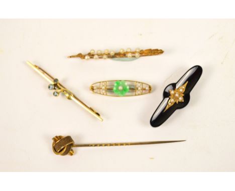 Two 15ct gold floral bar brooches, an unmarked yellow metal seed pearl and jade set floral bar brooch, a further bar brooch a