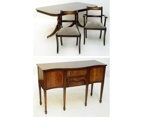A reproduction mahogany dining suite comprising extending dining table with rounded rectangular top on two tripod bases, leng