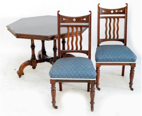 A reproduction mahogany centre table, the octagonal top above four ring turned supports united by a cross stretcher, width 10