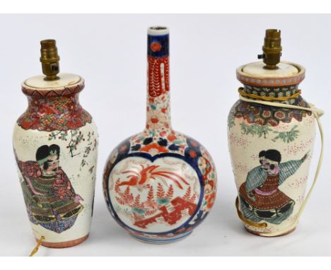 A 19th century Japanese Imari bottle vase, height 36cm, and a pair of decorative Japanese Satsuma vases, now converted to lam