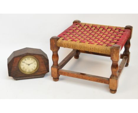 A 1930s Art Deco style oak mantel timepiece, the circular dial set with Arabic numerals, width 20cm, and a small wooden frame