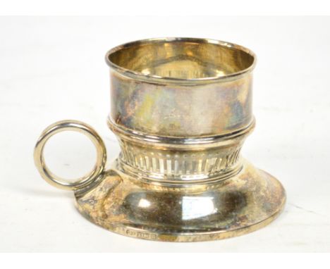 A George V hallmarked silver loaded "And so to bed" with simple ring handle and pierced decoration, Birmingham 1911, height 6