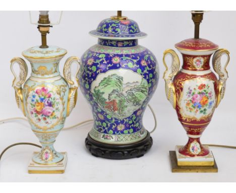 Three ceramic table lamps, one in the form of a large ginger jar and cover, two further modelled as twin handled urns (3).