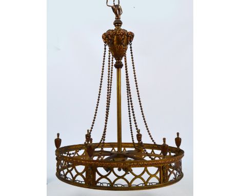 A gilt metal light fitting, the upper section set with six rams heads, each supporting a bead swag to the pierced circular ma