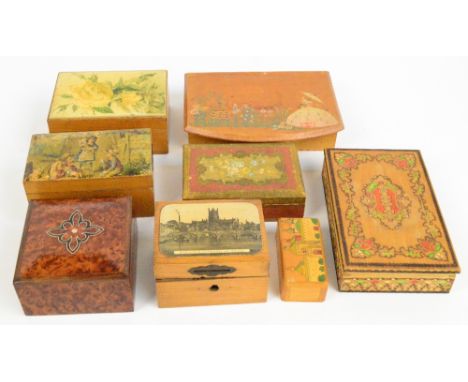 Eight vintage wooden trinket and money boxes including a pokerwork example, painted and printed examples and a birds eye mapl