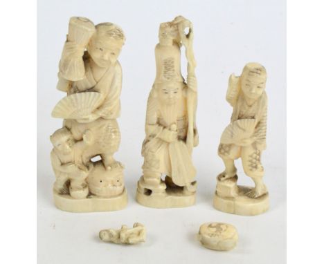 Three Japanese carved bone okimono, height 11cm, 9cm, and 11.5cm (some damage).