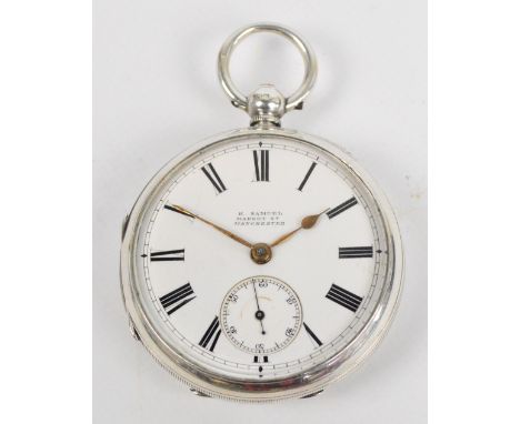 A late Victorian hallmarked silver key wind open face pocket watch, the white enamel dial set with Roman numerals and subsidi