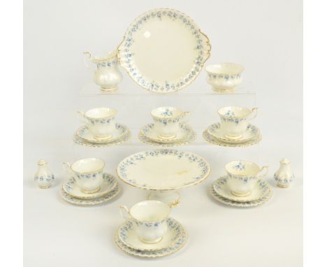 A Royal Albert "Memory Lane" tea service comprising six cups, six saucers, six side plates, a footed cake plate, sandwich pla