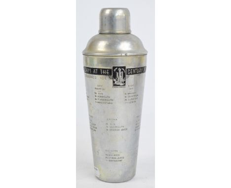 A 1930s Art Deco brushed aluminium cocktail shaker produced for the Chicago 1934 Exposition, the body inscribed "Happy Days a
