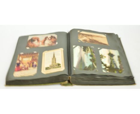 An early 20th century postcard album containing mainly British topographical, art, and humorous postcards, and portrait photo