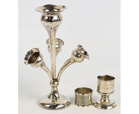 An early 20th century hallmarked silver three branch trumpet epergne on circular loaded base with presentation inscription da