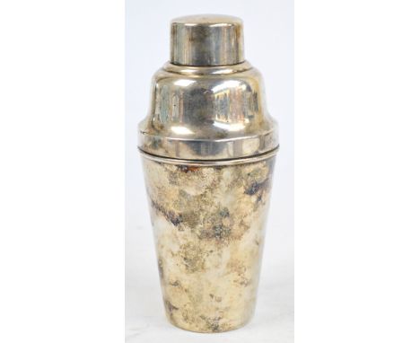 A large 1930s Art Deco electroplated two pint cocktail shaker, the upper section with lift-off cap and spiked lemon squeezer,