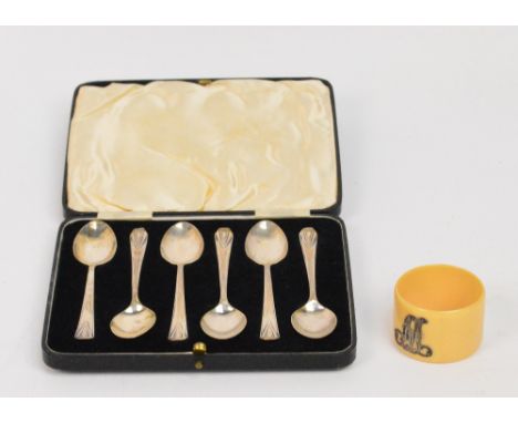 A cased set of six George VI hallmarked silver teaspoons, Sheffield 1939, approx 2ozt, and an ivorine napkin ring with hallma