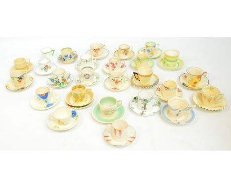 A collection of mostly hand painted Art Deco and later coffee cans and saucers including examples by Burleigh, Solian, Crown 