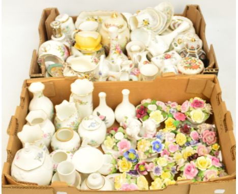 A large quantity of floral ceramics including flower embellished decorative items, pin dishes, vases, etc, including items by