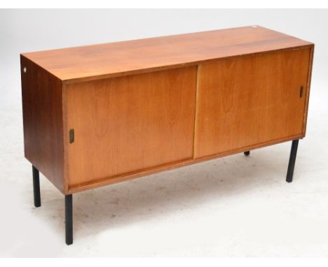 A 1950s sideboard by Hille, Tottenham Court Road, London, in plain design, the two sliding doors enclosing four drawers and a