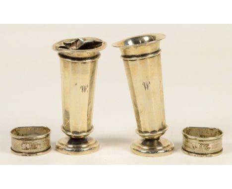 A pair of Edward VII hallmarked silver faceted vases raised on spreading circular feet, William Comyns & Sons Ltd, London 190