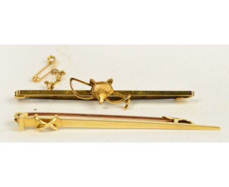 A 15ct gold tie pin, 2.5g and a 9ct fox head tie pin, approx 2g. CONDITION REPORT: Both in good condition.