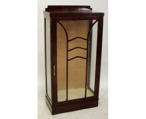 An Art Deco style walnut single door display cabinet.