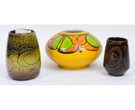 A Poole Pottery Atomic bowl in orange and green with Poole dolphin stamp to base, height 11cm, a Poole Aegean vase in green a