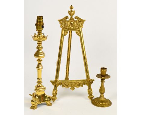 A decorative brass table lamp on tripod base, height 29cm, a brass bead decorated easel, height 40cm, and a brass gadrooned c