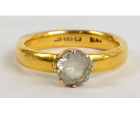 A 22ct yellow gold wedding band, now converted to a single stone ring set with a paste stone, size Q, approx 7.5g.