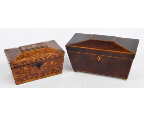 A Georgian mahogany and line inlaid sarcophagus form tea caddy on brass bun feet (lacking contents), width 28cm and a similar