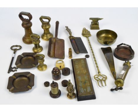 A quantity of metalware including a set of six graduated brass bell weights from 7lb to 4oz, five cylindrical weights, a crib