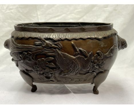 JAPANESE BRONZE OVAL PLANTER ON FOUR LEGS DECORATED WITH BIRDS AMIDST FOLIAGE 11.5CM H. 21CM L.