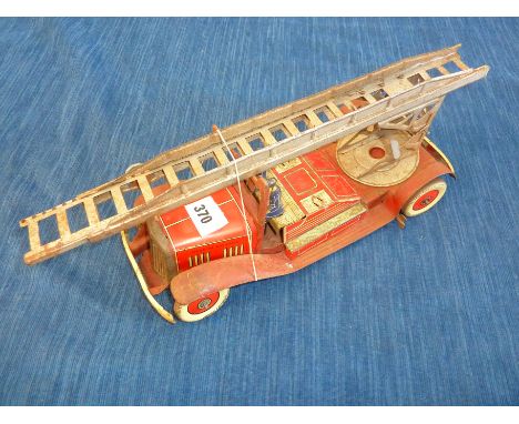 TIN TOY FIRE ENGINE CLOCKWORK WITH FORT DUNLOP WHEELS, TURNTABLE ESCAPE 2 CREW MISSING