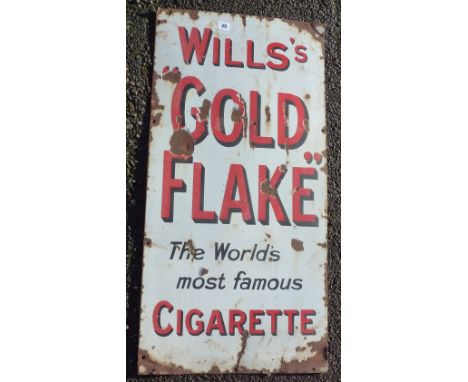 ENAMEL ADVERTISING SIGN WILLS'S GOLD FLAKE THE WORLDS MOST FAMOUS CIGARETTE. APPROX. 18 INS X 36 INS. MAINLY RED ON WHITE.