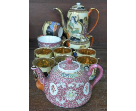 An oriental six setting tea service, one saucer a/f, a teapot and two tea bowls, one a/f 
