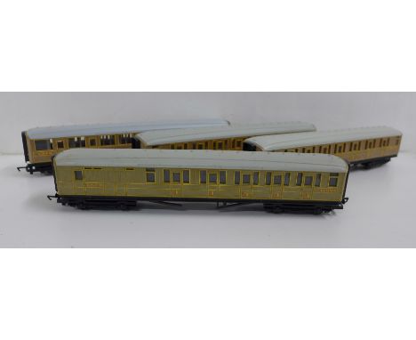 Four Hornby OO gauge model train coaches 
