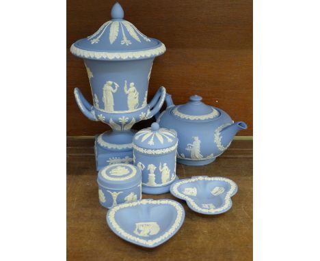 A Wedgwood Jasperware lidded Campana vase, teapot, two lidded pots and two pin trays, spout on teapot a/f