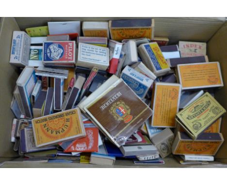 A collection of vintage matchboxes and matchbooks 