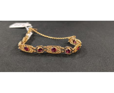 9K GOLD RUBY SET BRACELET