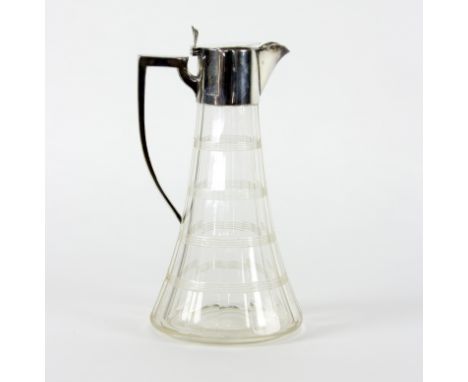 A silver mounted claret jug, William Hutton & Sons Ltd., Birmingham 1909, with tapered circular glass body, 25cm high