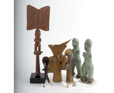 A small group of tribal items, including a ceremonial axe, 38cm high, a carved wooden vessel of plant form, incised 'Gods Tre