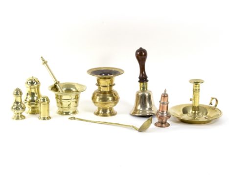 A brass spittoon, 15cm high, a pestle and mortar, a hand bell, a chamber candlestick, three castors and a ladle