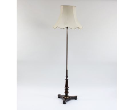 A rosewood standard lamp on a turned column and flat tripod support, 176cm high (converted from a 19th Century pole screen)