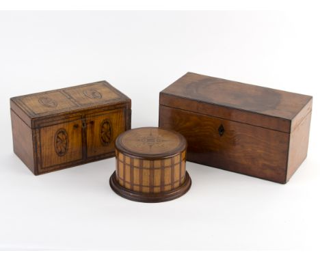A George III satinwood and featherbanded tea caddy, the top and front inlaid oval paterae, 23.5cm wide, another tea caddy (gu