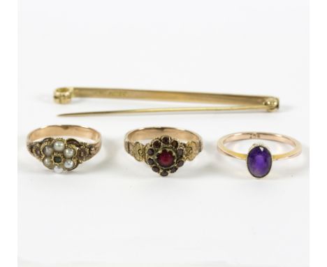 A Victorian garnet cluster ring, a seed pearl cluster ring similar, an amethyst single stone ring, a 9ct bar brooch and a gem