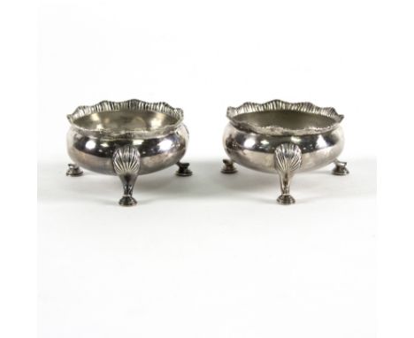 A pair of Chinese export silver salts, of compressed circular form with three scroll legs, character mark beneath, approximat