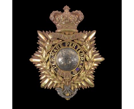 A Royal Marine Light Infantry Officer's helmet plate, with 'Gibraltar' above motto 'Per Mare Per Terram'/see illustration   C