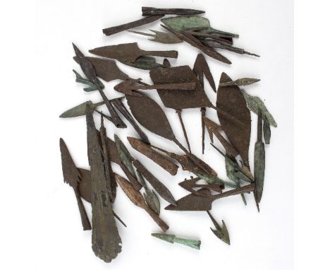 A group of various arrow heads include early bronze examples 